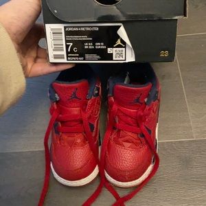 Toddler boy size 7 Jordan 4 Retro. Red/blue